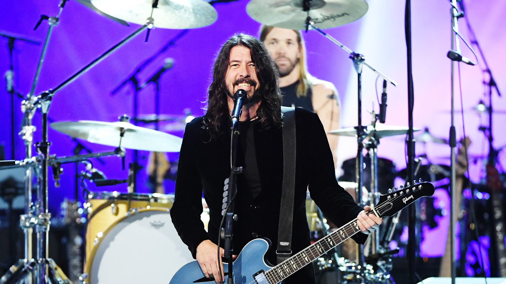 Foo Fighters announce rescheduled 26th-anniversary dates with a 'crapload' more to come
