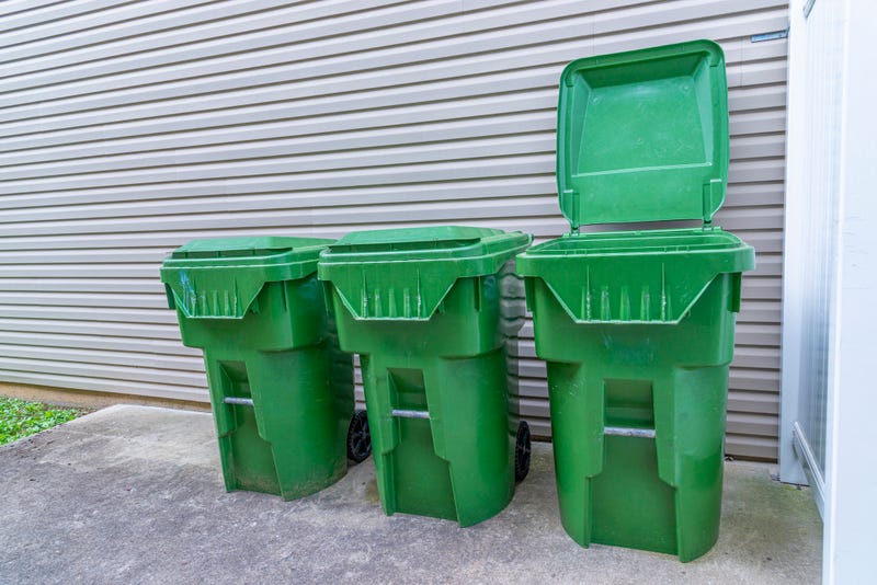 Stock photo of trash cans outside