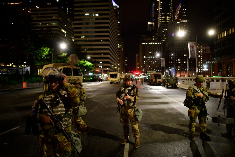 PHILADELPHIA, PA - JUNE 03: Members of the Pennsylvania National Guard monitor activity outside City Hall in the aftermath of widespread looting for the past five days on June 3, 2020 in Philadelphia, Pennsylvania. Demonstrations have erupted all across the country in response to George Floyd's death in Minneapolis, Minnesota while in police custody on May 25.