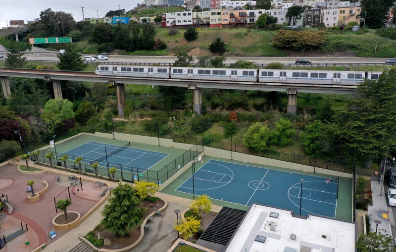 A Bay Area Rapid Transit (BART) train passes an empty playground on April 08, 2020 in San Francisco, California.