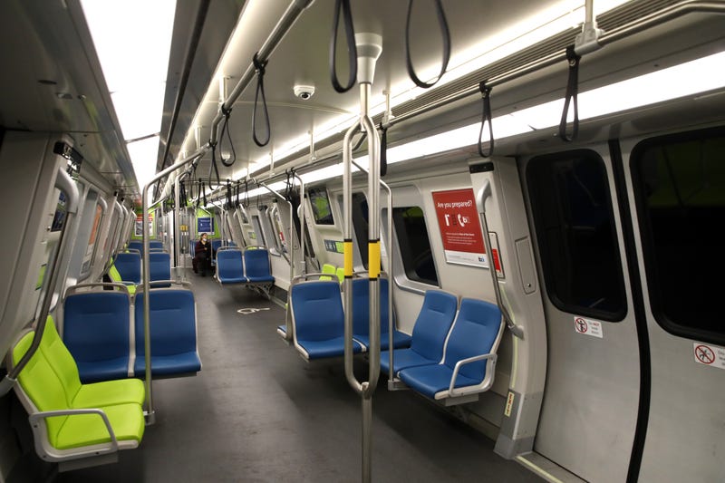 A Bay Area Rapid Transit (BART) passenger rides in an empty train car on April 08, 2020 in San Francisco, California. BART announced that it is slashing daily service as ridership falls dramatically due to the coronavirus shelter in place order.