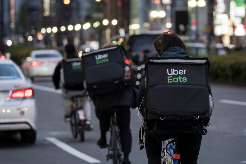 Uber Eats delivery men on bicycles
