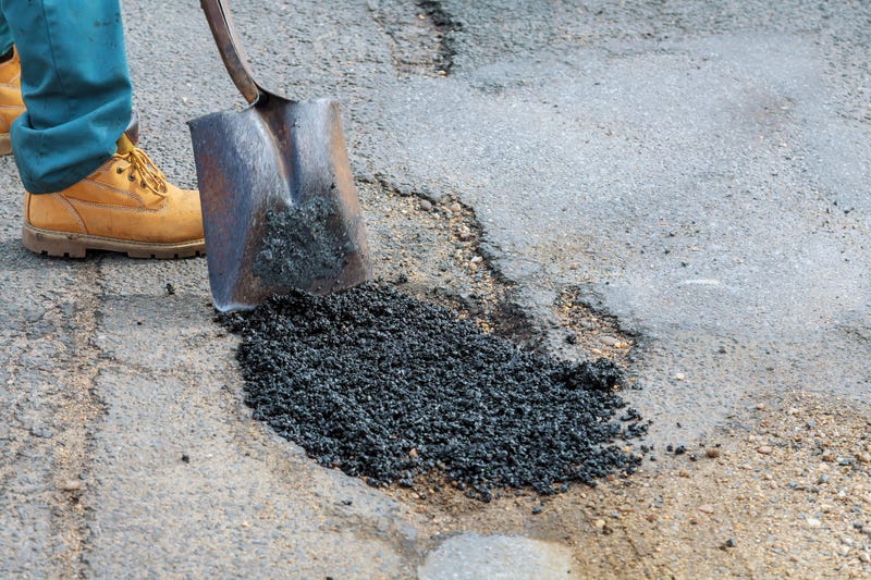 Pothole being repaired