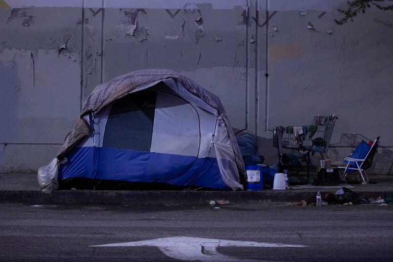 Homeless encampment on the side of the road.