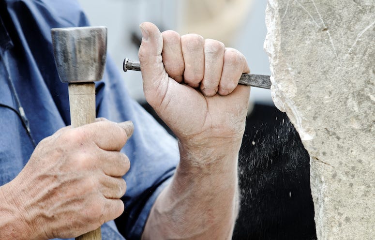 Stone sculptor at work