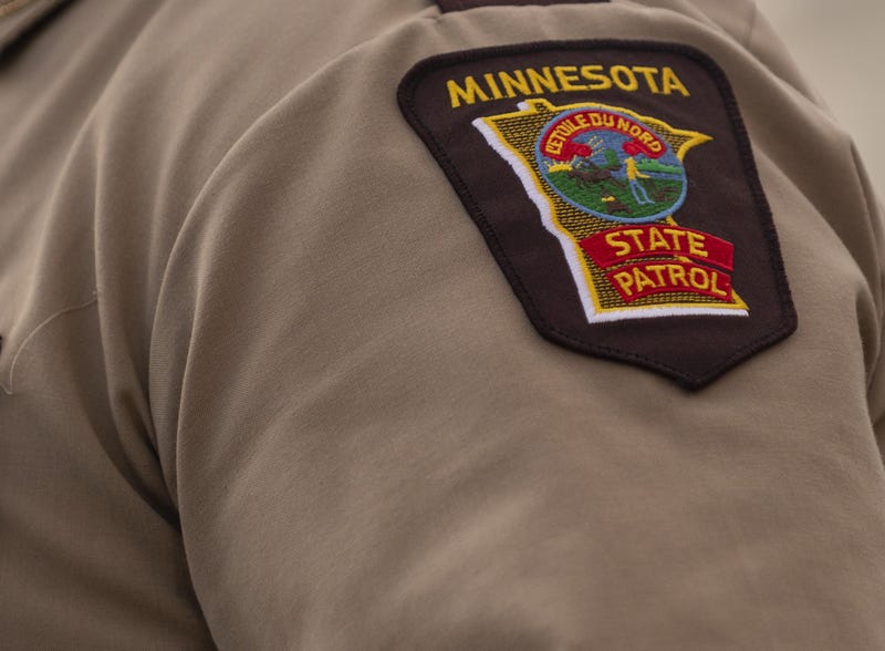 A former Minnesota State Trooper was booked into jail Monday on manslaughter charges.
