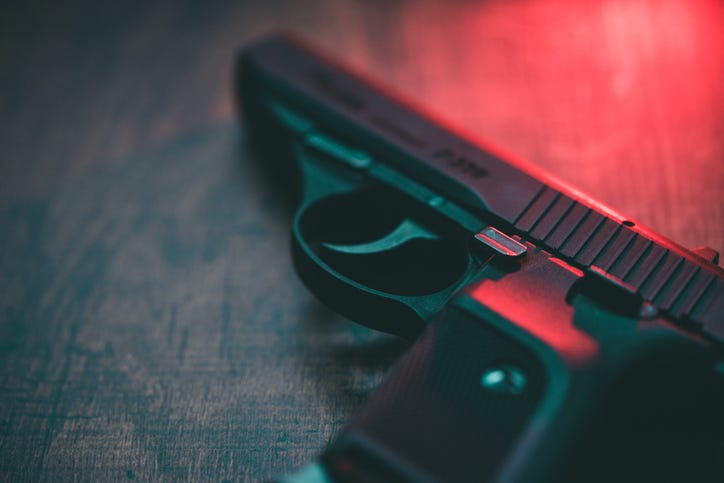 Handgun on a table. 