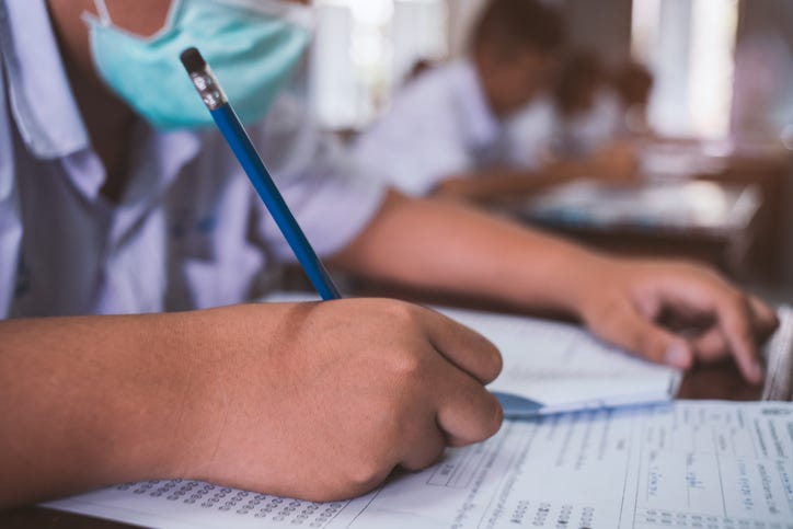 COVID cases on school campuses down from previous week