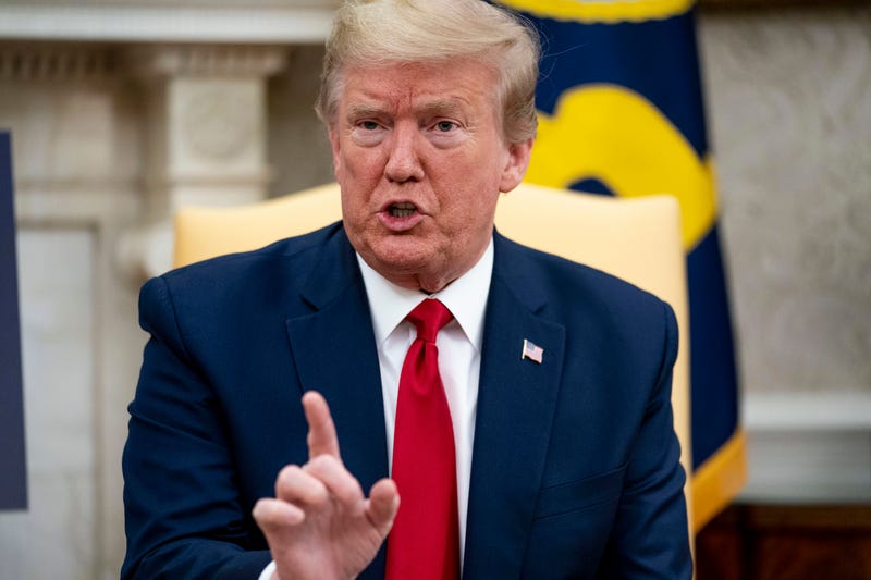 Trump speaks to reporters in the Oval Office at the White House in May 2020.