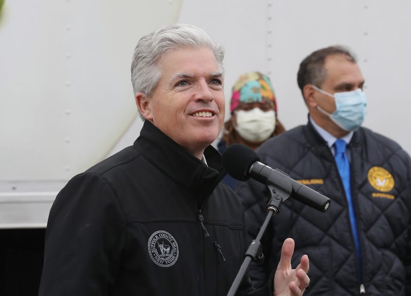 Suffolk County Executive Steve Bellone addresses the media as volunteers from Island Harvest Food Bank working in conjunction with the Nourish New York initiative distribute New York produced goods to people in need of food assistance on May 08, 2020 in Massapequa, New York.