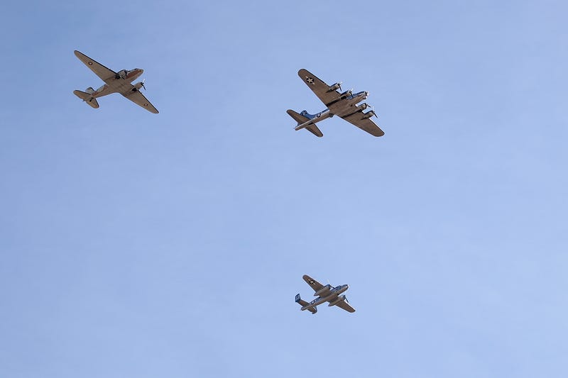 A B-17 "Flying Fortress" bomber, a B-25 Mitchell and a C-47 Skytrain perform a fly over above the National Memorial Cemetery of Arizona in 2020.