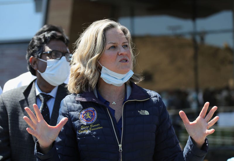 Nassau County Executive Laura Curran addresses frontline hospital workers at Mount Sinai South Nassau Hospital as first responders including the Nassau County Police Department's 'Pipes & Drums' salute them on May 13, 2020 in Oceanside, New York.
