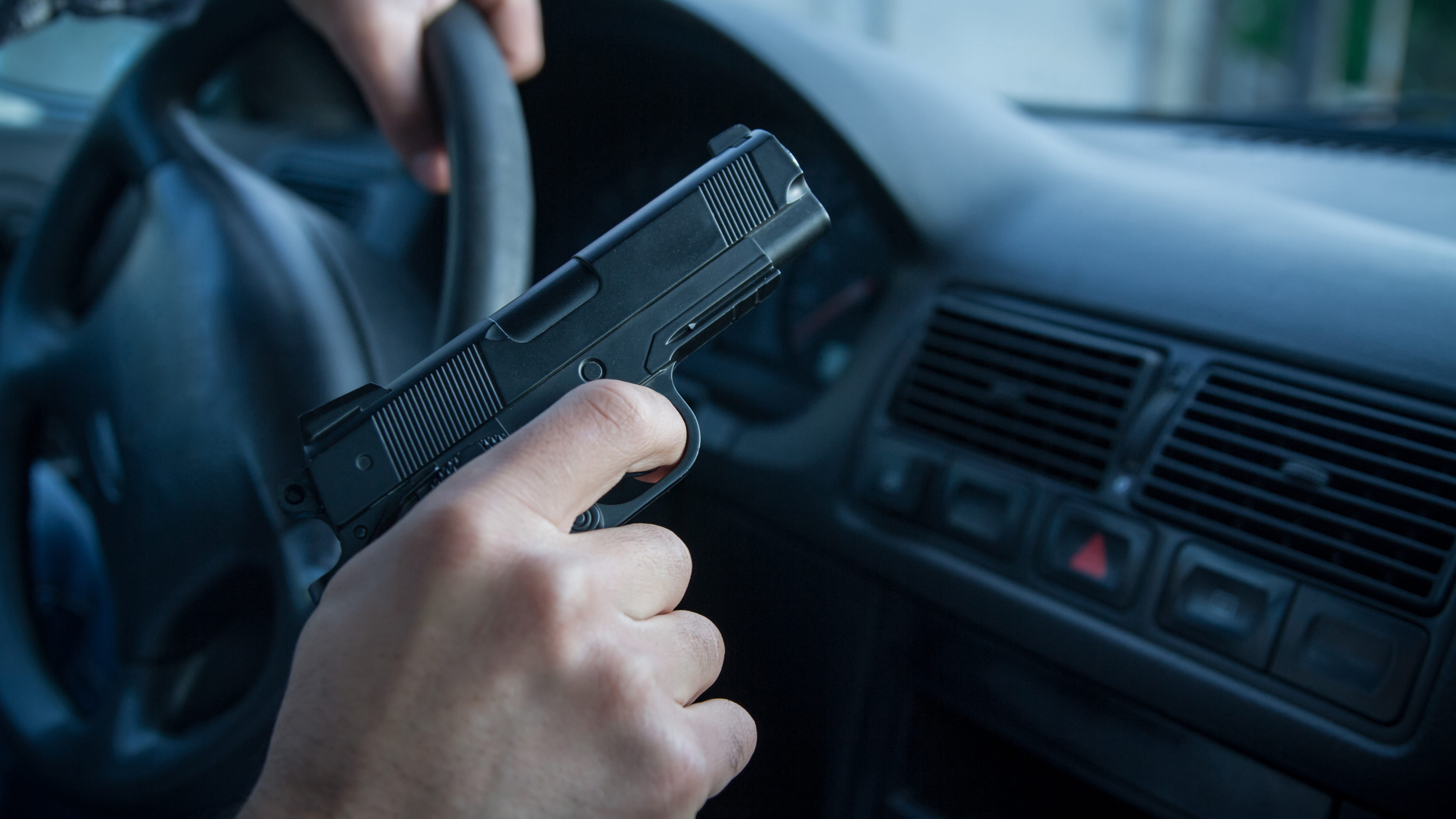 Suspect driver brandishes handgun, cusses out other motorist after merging incident on I-94