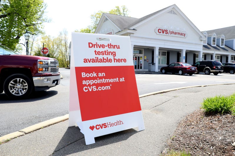 A sign promoting drive-thru coronavirus (COVID-19) tests at CVS Pharmacy on May 15, 2020 in Bridgewater, Massachusetts. Nine CVS locations began providing coronavirus tests in Massachusetts, issuing self swab tests to people by appointment. 