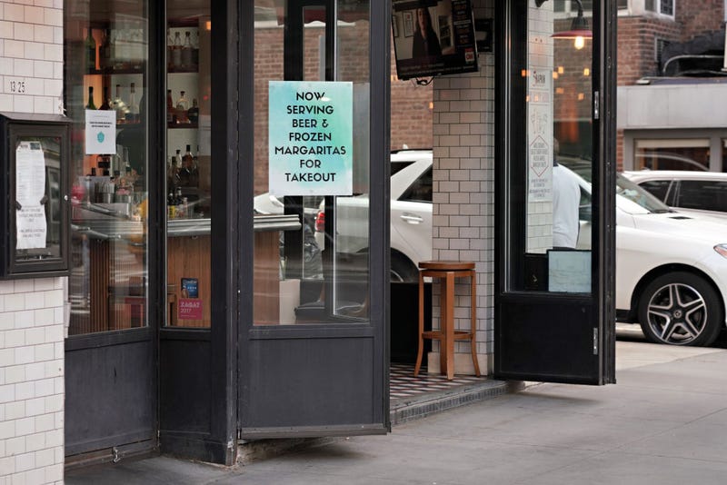 Sign promoting to-go cocktails