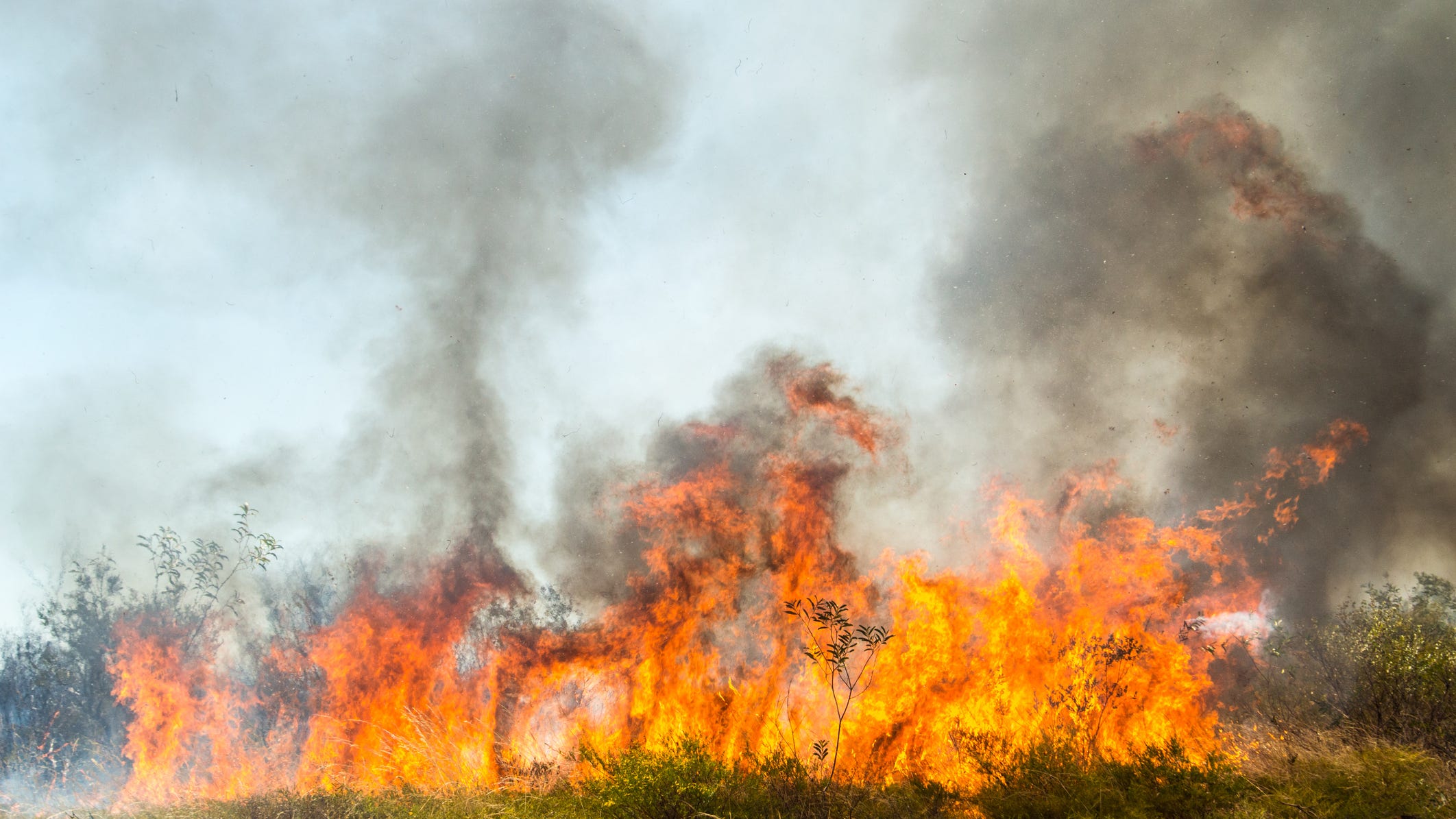 Hot and dry weather has grass fires raging in areas of North Texas