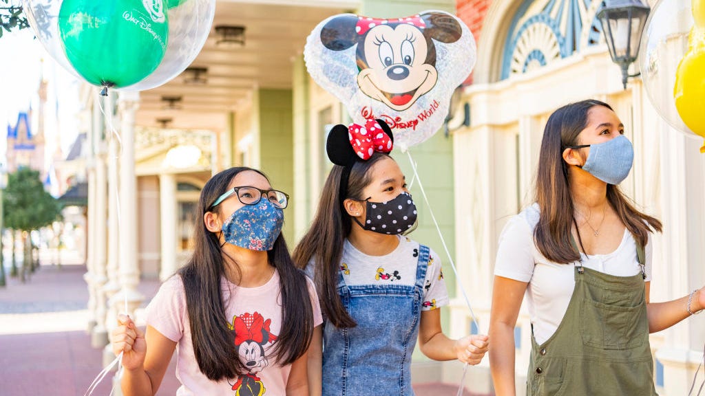 Disney tells visitors to mask up, regardless of vaccination status