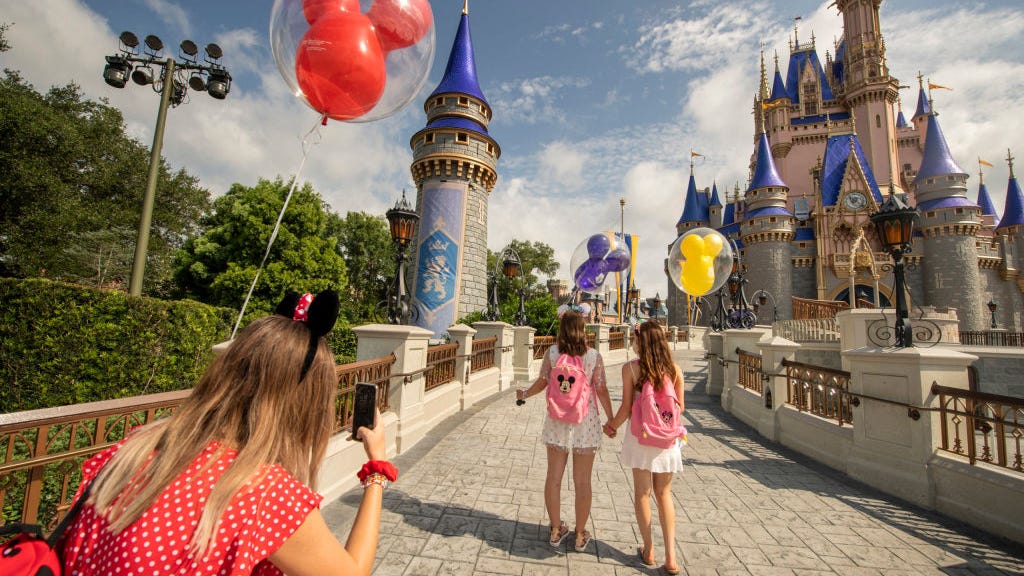 Disney World plans 'gradual adjustments' to ease COVID restrictions for guests