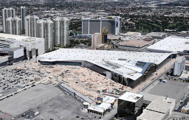An aerial view shows the closed Westgate Las Vegas Resort & Casino (C, top) and the Las Vegas Convention Center and its 1.4 million-square-foot expansion under construction on May 21, 2020 in Las Vegas