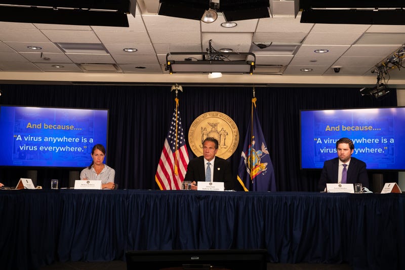 Secretary to Governor Melissa DeRosa, New York Gov. Andrew Cuomo, and Deputy Superintendent & Special Counsel at NYS Department of Financial Services Gareth Rhodes speak during the daily media briefing at the Office of the Governor of the State of New York on July 23, 2020 in New York City