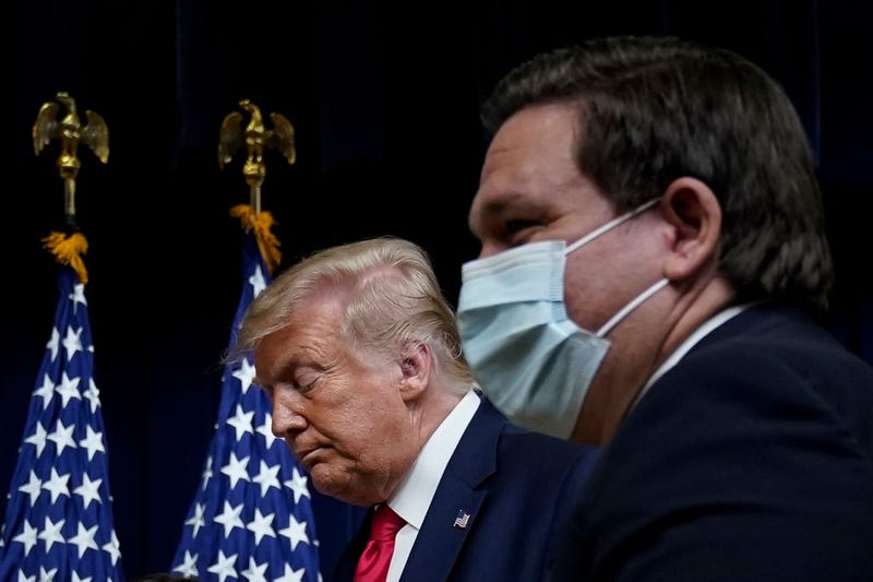 President Donald Trump and Florida Governor Ron DeSantis depart after President Trump signed executive orders on prescription drug prices in the South Court Auditorium at the White House on July 24, 2020 in Washington, DC. President Trump signed a series of four executive orders aimed at lowering prices that for prescription drugs in the United States. (Photo by Drew Angerer/Getty Images)