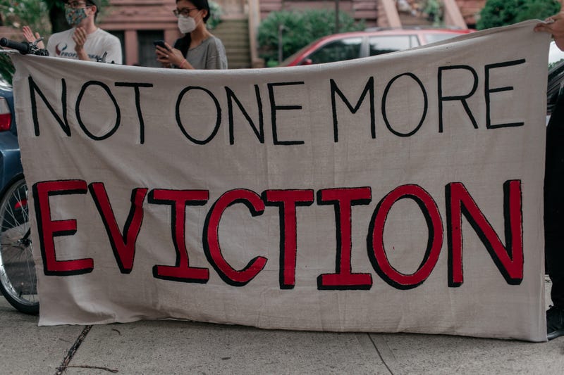 Housing activists gather to protest alleged tenant harassment by a landlord and call for cancellation of rent in the Crown Heights neighborhood on July 31, 2020 in Brooklyn, New York. Since the onset of the coronavirus crisis, millions of Americans have fallen behind on rent payments, leading many to speculate that an eviction crisis and drastic rise in homelessness is inevitable unless drastic action is taken by state and federal lawmakers.