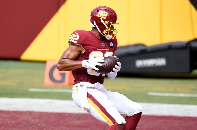 Logan Thomas catches a ball in the end zone for the Washington Football Team.