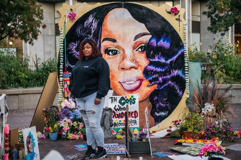 Tamika Palmer, mother of Breonna Taylor, poses for a portrait in front of a mural of her daughter at Jefferson Square park on September 21, 2020 in Louisville, Kentucky.