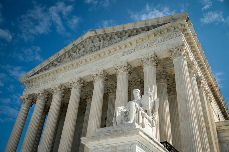 The Guardian or Authority of Law, created by sculptor James Earle Fraser, rests on the side of the U.S. Supreme Court on September 28, 2020 in Washington, D.C.