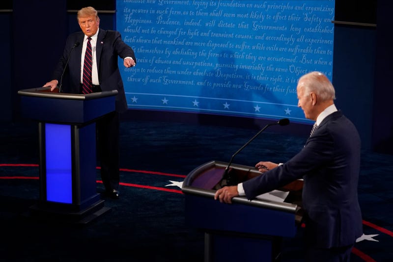 U.S. President Donald Trump and former Vice President and Democratic presidential nominee Joe Biden speak during the first presidential debate at the Health Education Campus of Case Western Reserve University on September 29, 2020 in Cleveland, Ohio. This is the first of three planned debates between the two candidates in the lead up to the election on November 3. (Photo by Morry Gash-Pool/Getty Images)