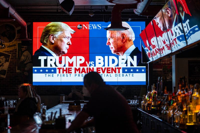 elevision screens airing the first presidential debate are seen at Walters Sports Bar on September 29, 2020 in Washington, United States.
