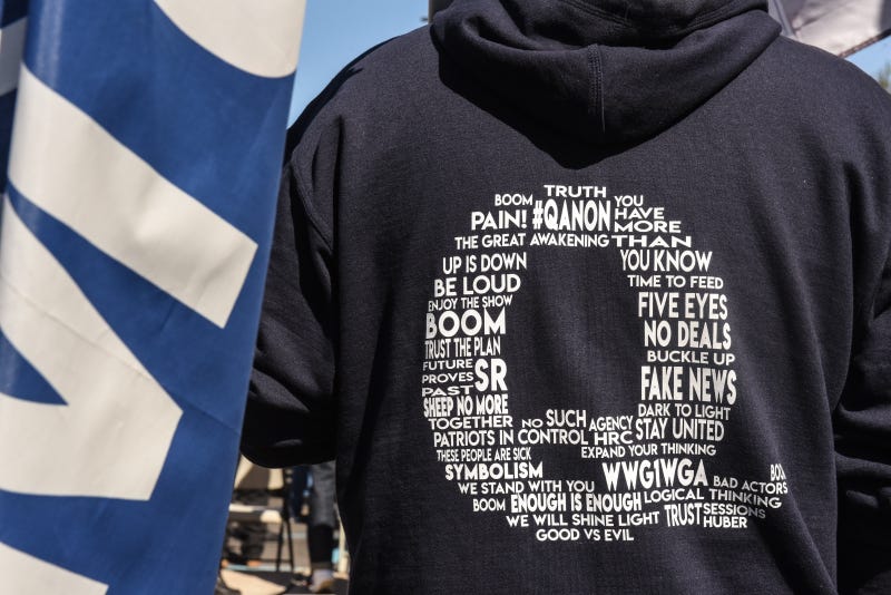 A person wears a QAnon sweatshirt during a pro-Trump rally on October 3, 2020 in the borough of Staten Island in New York City.