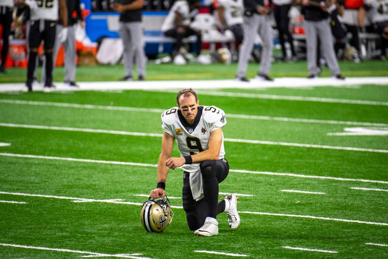 Drew Brees take a knee during the Saints' Week 4 game against the Lions