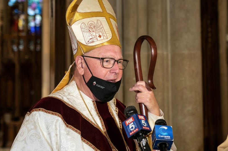 Cardinal Timothy Dolan speaks to media after the NYPD (new york police department) mass honoring members who died of COVID-19 at St. Patrick's Cathedral. 46 members of NYPD died during pandemic so far and many of them did not receive proper funerals due to pandemic restrictions. Almost 20% of NYPD members were sick with coronavirus during the pandemic in the city. Cardinal Timothy Dolan led the mass. Mayor Bill de Blasio and Police commissioner Dermot Shea spoke.