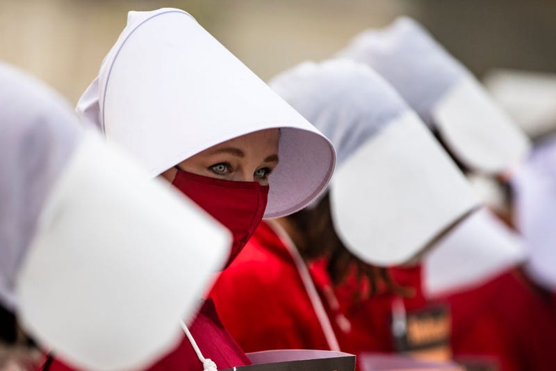 Protestors have worn Handmaid's Tale outfits before. Here, they stand outside of the United States Supreme Court on October 22, 2020 in Washington, DC.