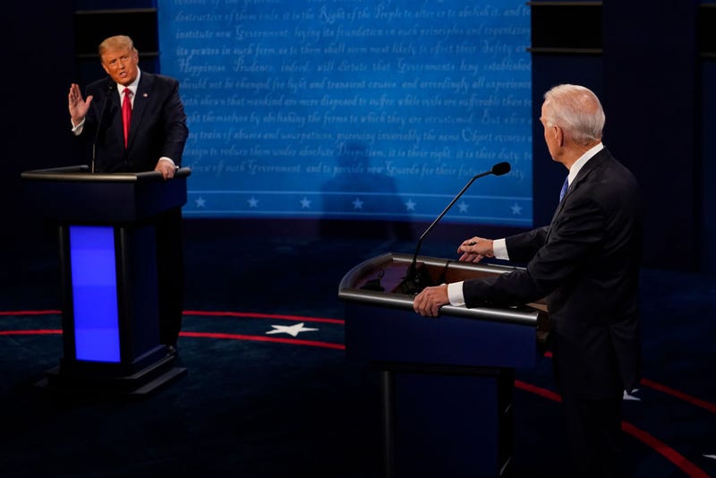 President Donald Trump answers a question as Democratic presidential candidate former Vice President Joe Biden listens during the second and final presidential debate at Belmont University on October 22, 2020 in Nashville, Tennessee. This is the last debate between the two candidates before the election on November 3. (Photo by Morry Gash-Pool/Getty Images)