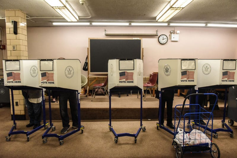 People vote at the Queens Public Library during early voting for the U.S. Presidential election on October 24, 2020 in the Jackson Heights neighborhood in the Queens borough in New York City.