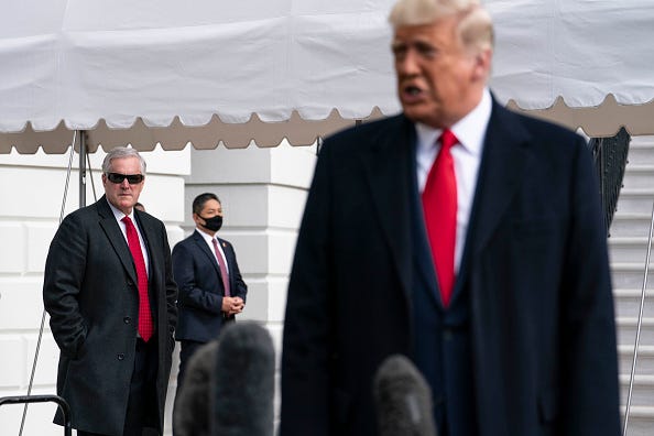 Chief of Staff Mark Meadows listens as President Donald Trump speaks