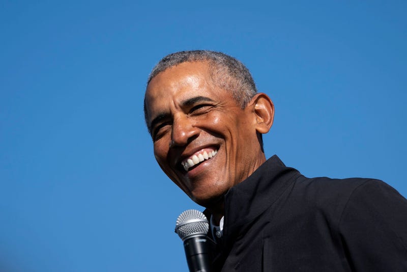 Former U.S. President Barack Obama speaks during a drive-in campaign rally for Democratic presidential nominee Joe Biden at Northwestern High School on October 31, 2020 in Flint, Michigan.