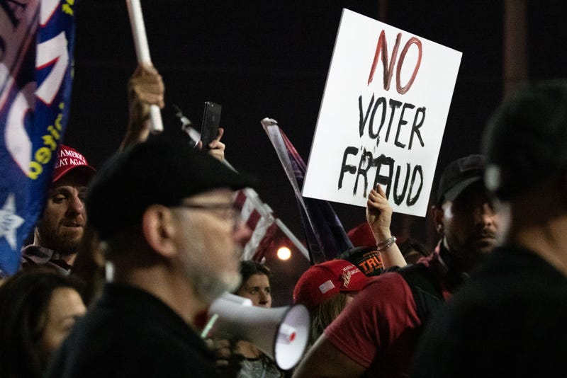 A no voter fraud sign is displayed by a protester in support of President Donald Trump at the Maricopa County Elections Department office on November 4, 2020 in Phoenix, Arizona. The rally was organized after yesterday's vote narrowly turned for Democrats in the presidential and senate races. (Photo by Courtney Pedroza/Getty Images)