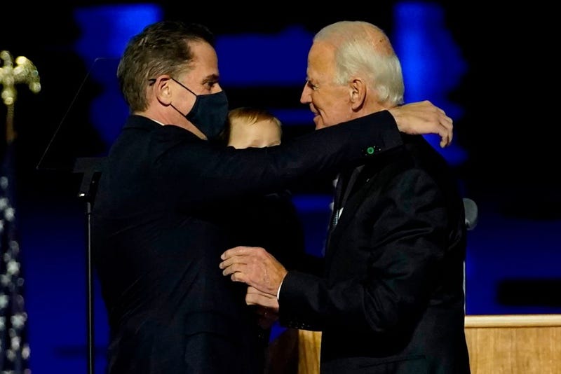 President-elect Joe Biden embraces his son Hunter Biden after addressing the nation from the Chase Center November 07, 2020 in Wilmington, Delaware. After four days of counting the high volume of mail-in ballots in key battleground states due to the coronavirus pandemic, the race was called for Biden after a contentious election battle against incumbent Republican President Donald Trump. (Photo by Andrew Harnik-Pool/Getty Images)