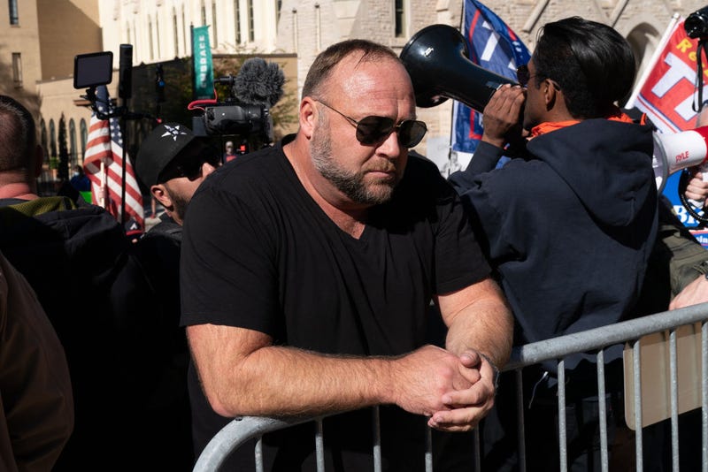 Alex Jones, host of Infowars, an extreme right-wing program that often trafficks in conspiracy theories, is seen at a "Stop the Steal" rally against the results of the U.S. Presidential election outside the Georgia State Capitol on November 18, 2020 in Atlanta, Georgia. 