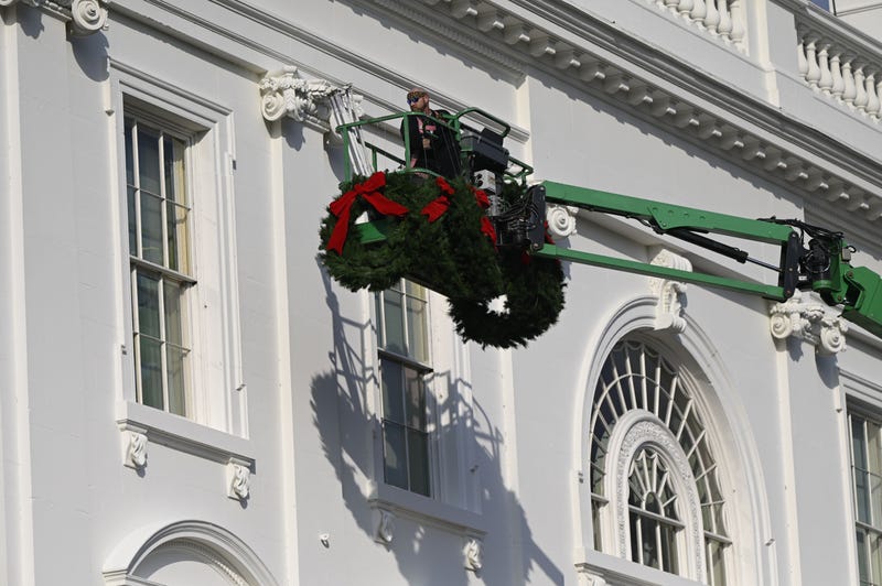 Christmas wreaths are installed at the White House in Washington, DC, on November 21, 2020. 