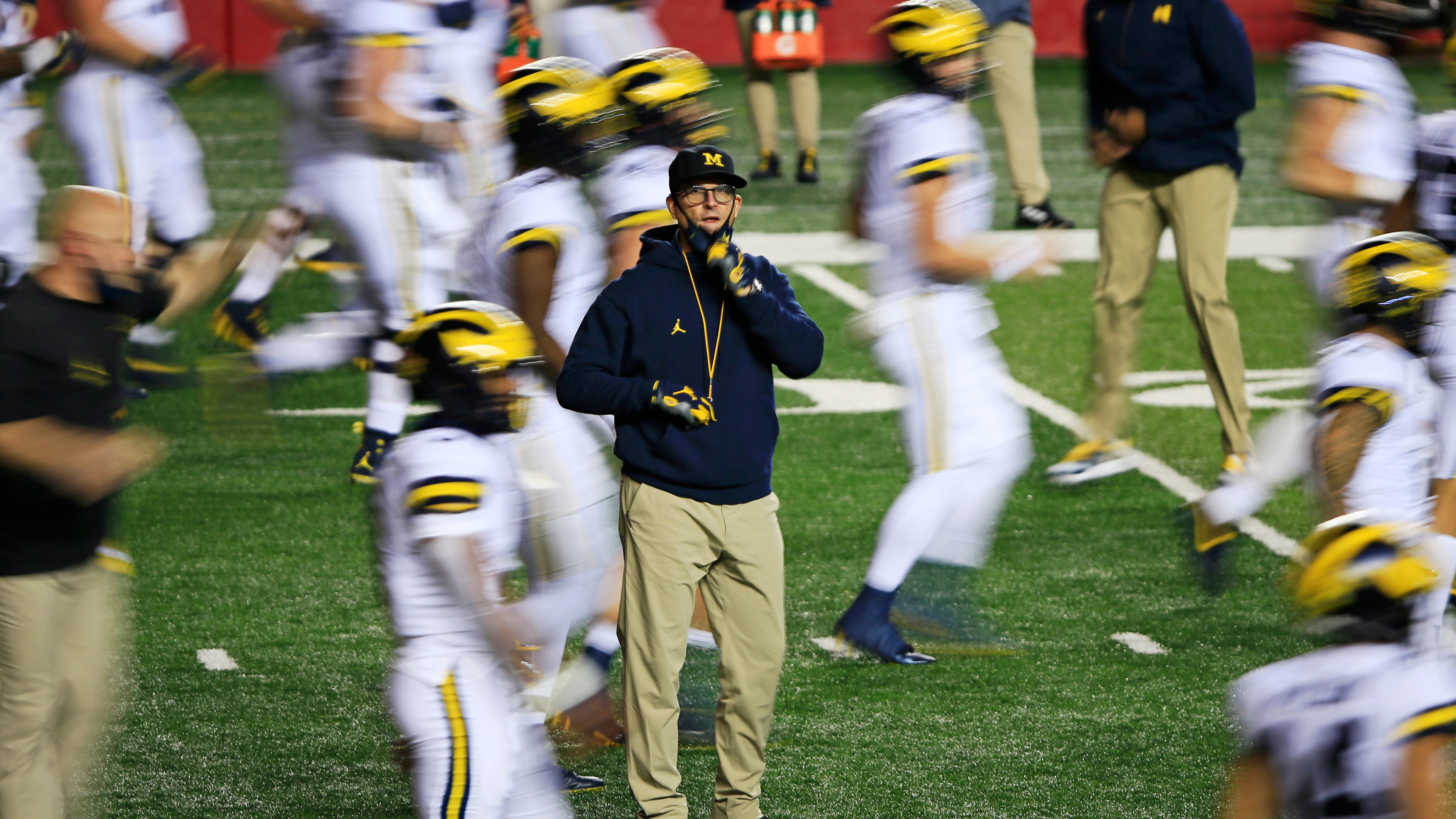 Harbaugh blocking out frustrations of former players: "I really don’t hear them"