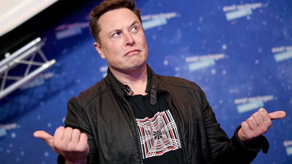 Elon Musk says Tim Cook snubbed him when he tried to sell Tesla to Apple