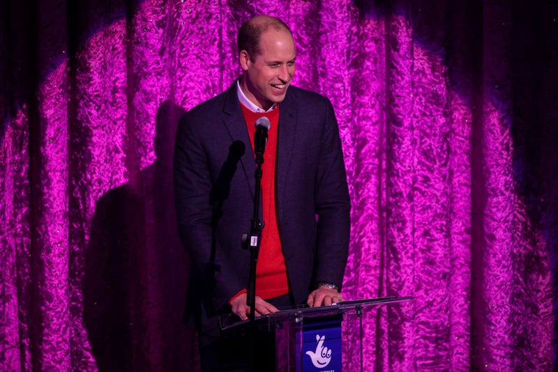 Prince William, Duke of Cambridge gives a speech on stage as he attends a special pantomime performance at London's Palladium Theatre, hosted by The National Lottery, to thank key workers and their families for their efforts throughout the pandemic on December 11, 2020