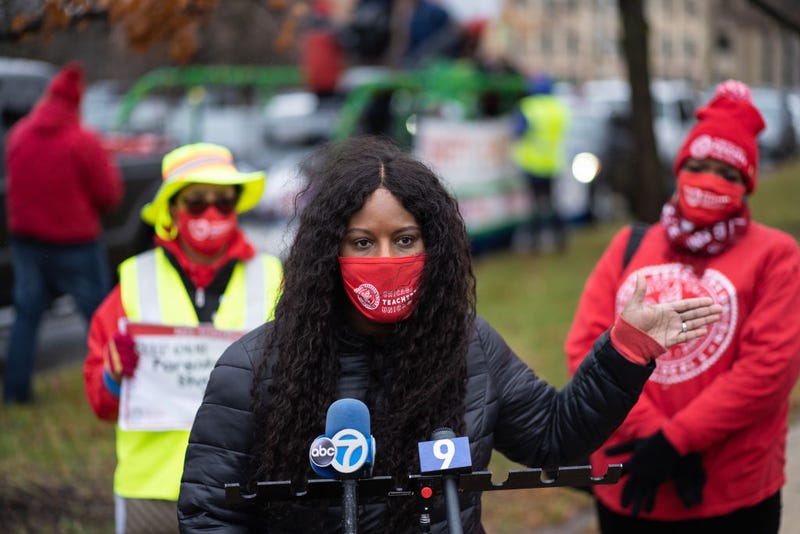 Chicago Teachers Union Vice President Stacy Davis Gates speaks ahead of a car caravan where teachers and supporters gathered to demand a safe and equitable return to in-person learning during the COVID-19 pandemic in Chicago on December 12, 2020.