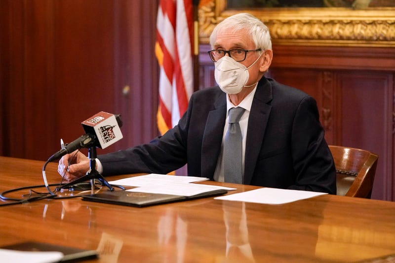 Wisconsin Gov. Tony Evers, a member of Wisconsin's Electoral College, casts his vote for the presidential election at the state Capitol on December 14, 2020 in Madison, Wisconsin.