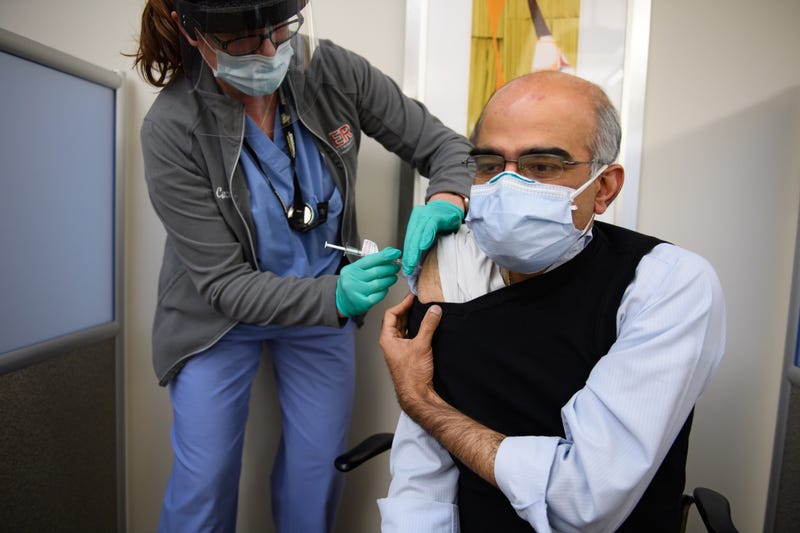 Nurse Mary Catherine Klee injects a dose of the Pzifer COVID-19 vaccine into Dr. Mohan Ramkumar MD at the Pittsburgh VA Medical Center on December 17, 2020 in Pittsburgh, Pennsylvania.