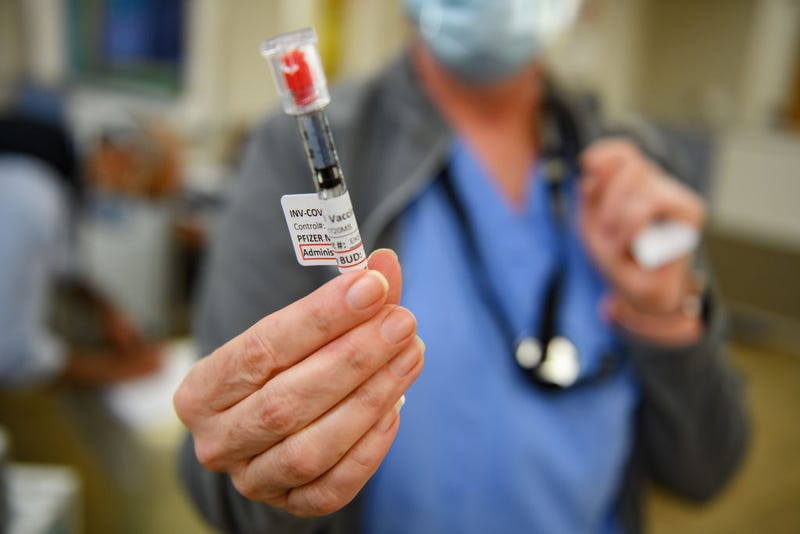 Nurse Mary Catherine Klee holds a dose of the Pzifer COVID-19 vaccine before administering it to an employee of the Pittsburgh VA Medical Center on December 17, 2020 in Pittsburgh, Pennsylvania. 